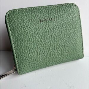 Matt & Natt small zip-around accordion green pebbled leather wallet. NWOT
